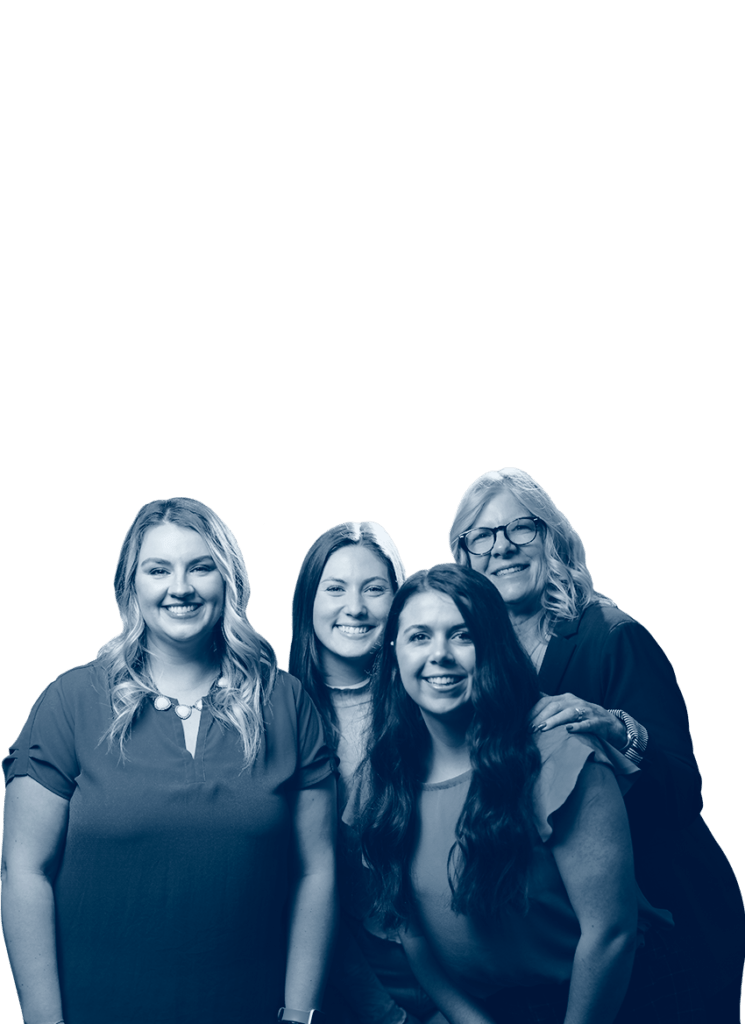 A group photo of Jonas Fitness employees smiling at the camera.